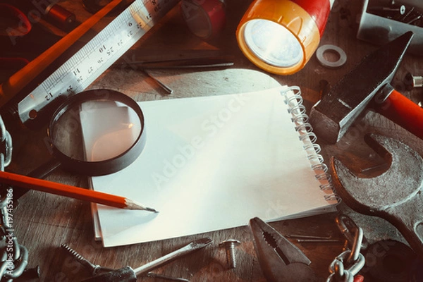 Obraz Workbench with notebook and pencil