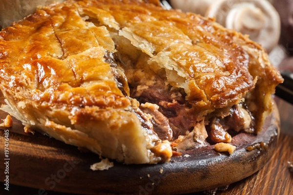 Fototapeta Fresh beef stew pie on a cutting board