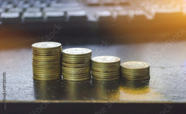 Obraz gold coin set isolate on keyboard background