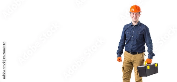 Fototapeta Portrait of repairman (builder) in helmet and with tool box in hands isolated on white background. Copy space