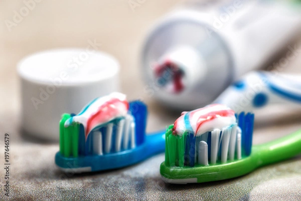 Fototapeta toothbrush and toothpaste on the shelf