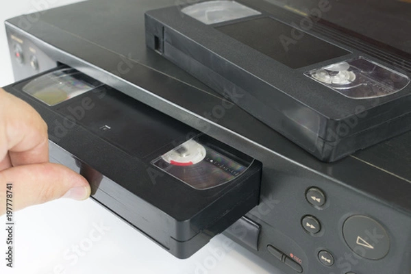 Obraz  videotape into a tape recorder