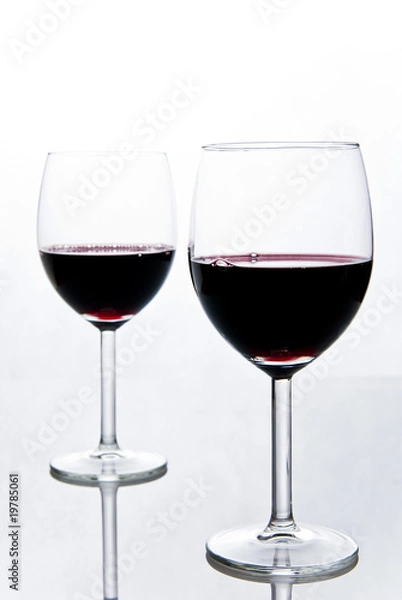 Fototapeta two wineglasses isolated on white background