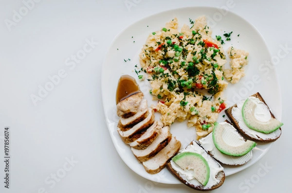 Fototapeta Plate with food on a white background