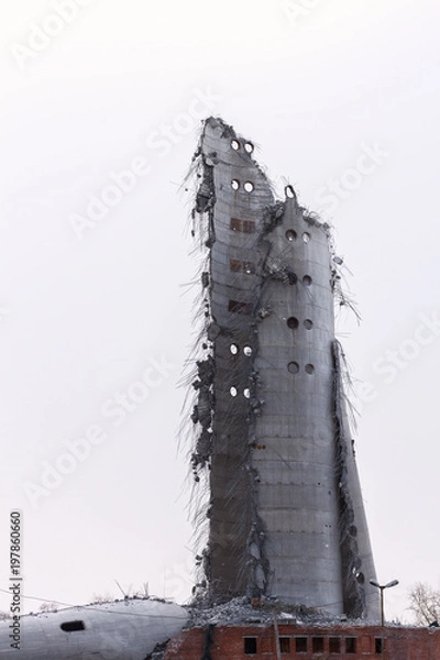 Fototapeta Demolition of abandoned television tower in Ekaterinburg in 24th of March 2018. remains of the destroyed tower