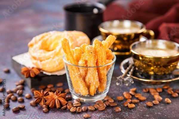 Fototapeta Eclairs and coffee on a table. Selective focus. Copy space