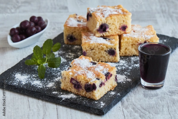 Obraz fresh tassty cherry fruit sponge cake with sugar