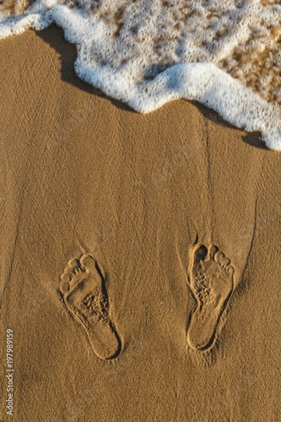 Fototapeta Footprints on sand