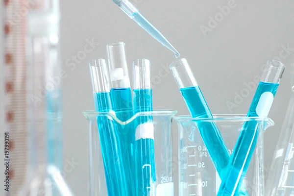 Fototapeta Test tubes closeup, science laboratory research and development concept