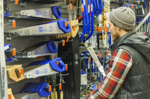 Obraz Man in a hardware store