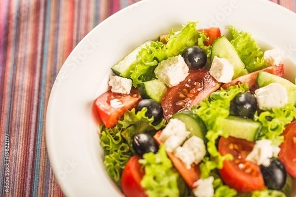 Fototapeta Fresh spring salad with vegetable