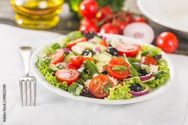 Fototapeta Fresh spring salad with vegetable
