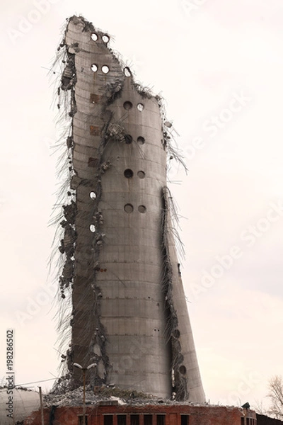 Fototapeta Demolition of abandoned television tower in Ekaterinburg in 24th of March 2018. remains of the destroyed tower