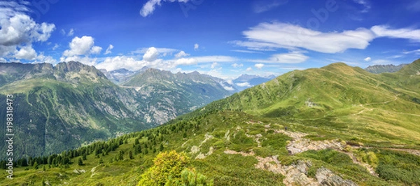 Fototapeta Panorama of the Alps in summer. View on the Emosson dam in Switzerland during Tour du Mont Blanc hike