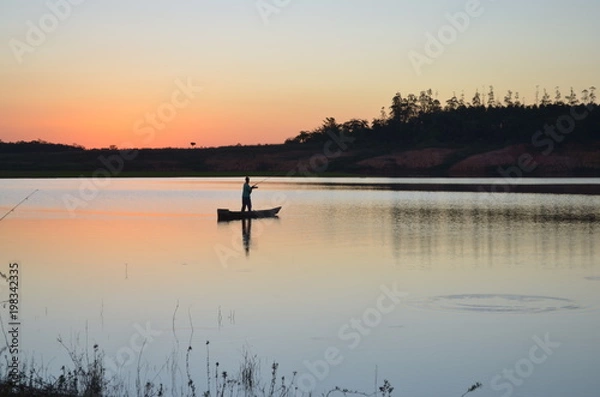 Fototapeta PESCADOR E PÔR DO SOL