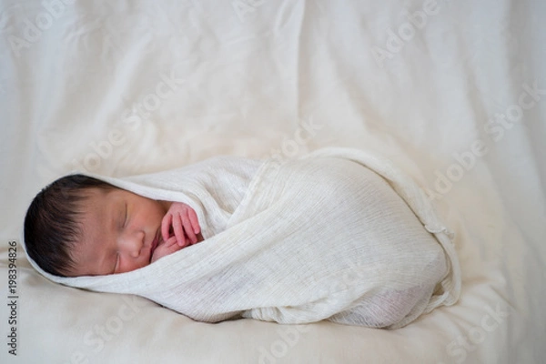 Obraz 包まれた赤ちゃん