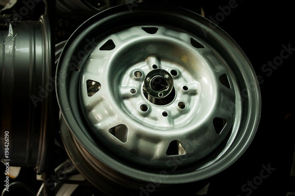 Fototapeta wheels disks in the car dealer