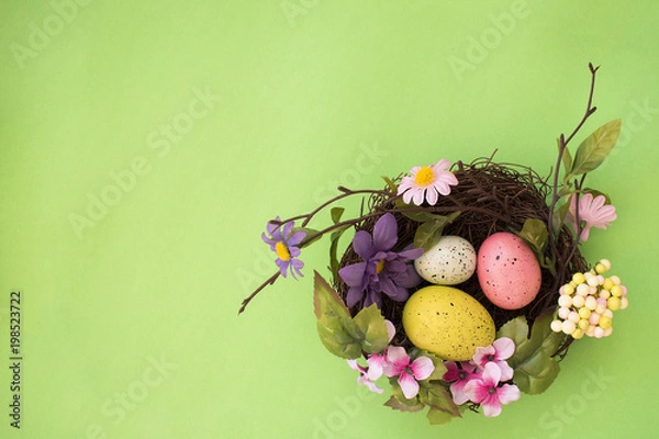 Fototapeta Happy Easter. Congratulatory easter background. Easter eggs and flowers.