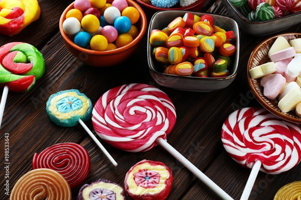 Fototapeta candies with jelly and sugar. colorful array of different childs sweets and treats.