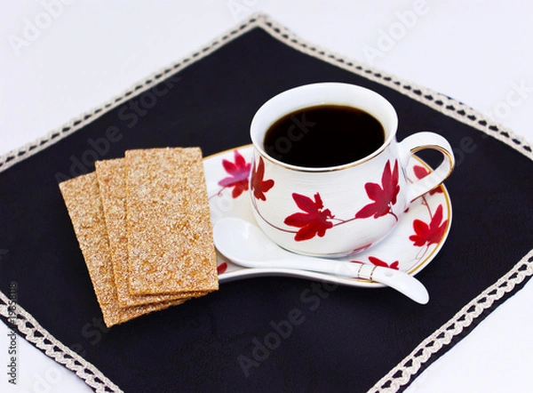 Obraz Bread and cup of coffee on napkin