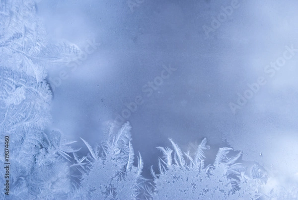 Obraz Slightly blurred beautiful frostwork on a window glass