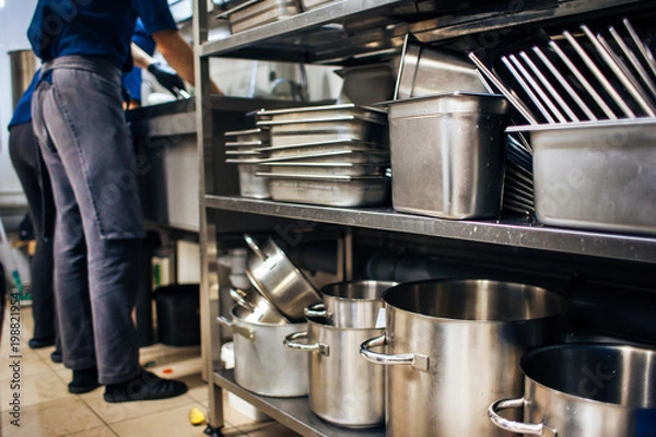 Obraz kitchen rack with clean pots and trays
