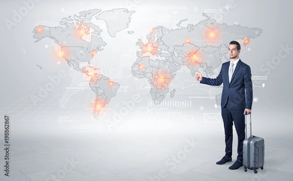 Fototapeta Businessman in dark suit hitchhike to business trip in a front of a map with destination