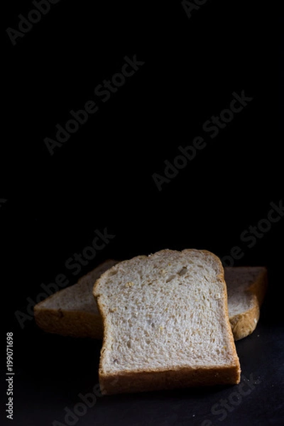Fototapeta Bread isolate on Black background
