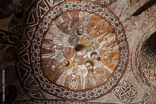 Fototapeta wall murals of saints and iconographic scenes, painted in naive african christian style, on wall of Abuna Yemata Guh church 