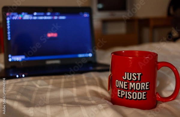 Obraz Watching series with a cup of tea. Just one more episode. Millennial concept