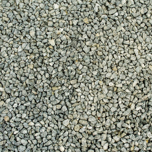 Fototapeta Gray fine gravel granite texture. Abstract background. Square.