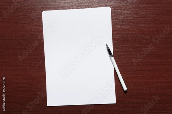 Fototapeta White business card on wooden table. Blank portrait A4.