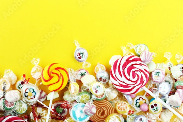 Fototapeta candies with jelly and sugar. colorful array of different childs sweets and treats.