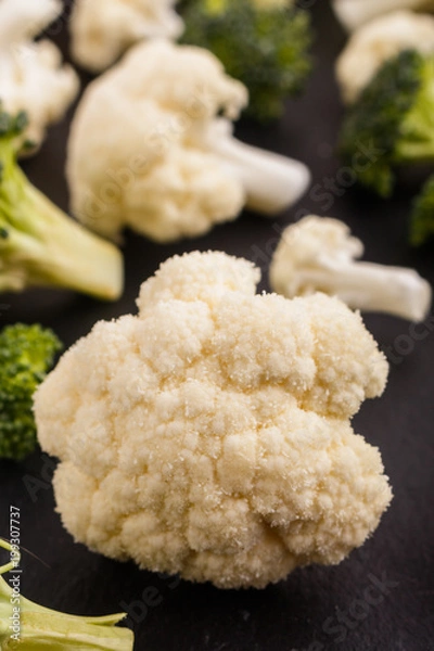 Fototapeta cauliflower and broccoli on a rustic background