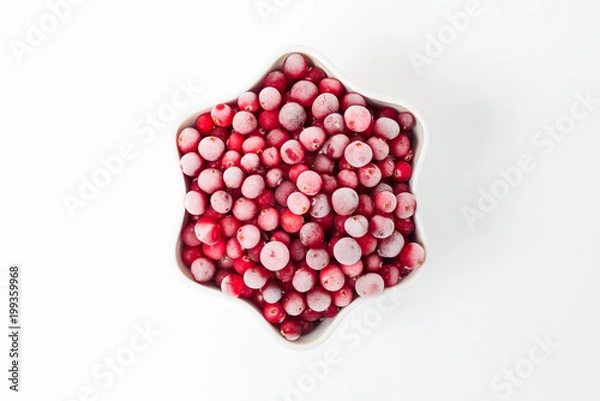 Fototapeta frozen cranberries on white background for your logo