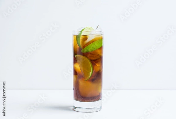 Obraz Cuba libre cocktail on the rustic background. Selective focus.