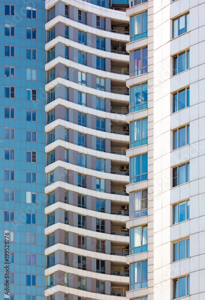 Fototapeta Windows in the building as a background