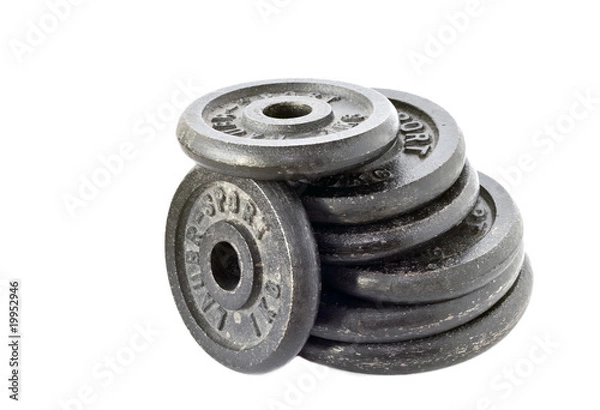 Obraz dumbbell weights stacked and isolated on white