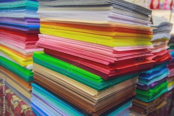 Fototapeta Multicolored paper for creativity on the counter of the store. Scrapbooking