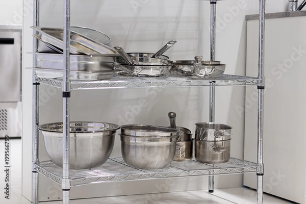 Fototapeta Professional cookware on the shelf