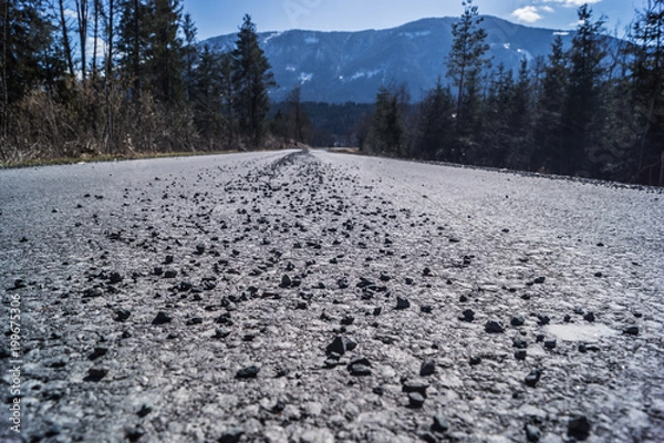 Obraz Streu-splitt auf einer Straße