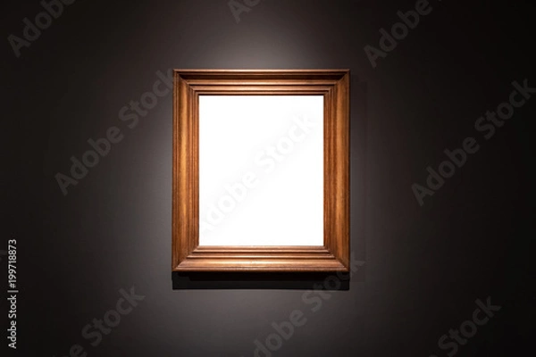 Fototapeta Blank hanging individual frame in an art gallery black background