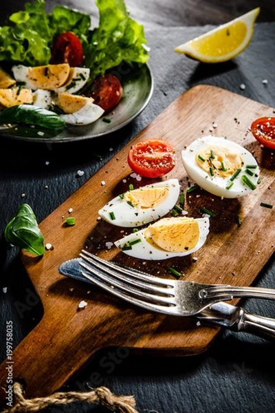 Fototapeta Boiled eggs and vegetables 