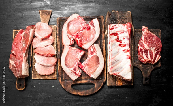 Fototapeta Different types of raw pork meat and beef.