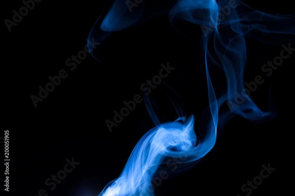 Fototapeta Abstract beautiful smoke on a black background