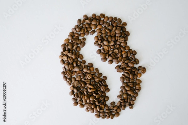 Fototapeta Coffe beans arranged into coffee bean