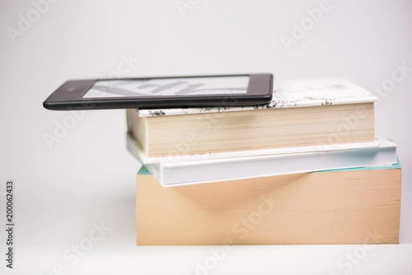 Fototapeta Online reading of books. A reader for books. Online library.