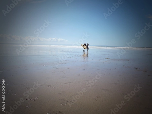 Fototapeta Surfers walk