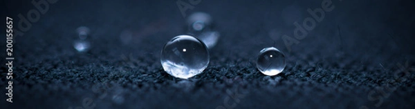 Obraz krople wody na tekstyliach