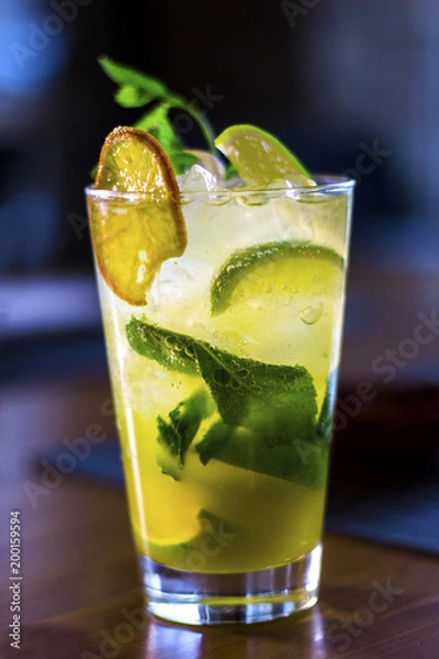 Fototapeta Freshly made lemonade with mint, ice cube and lime